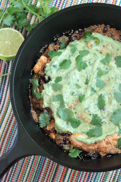 One-Pot Quinoa and Chicken Enchilada Skillet with Avocado Cream