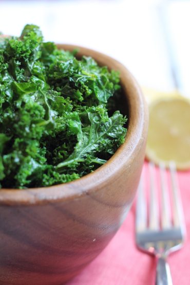 Sautéed kale with ghee, fresh lemon juice, and garlic is the best side dish! Paleo and whole30 compliant.